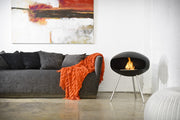 Cojín TERRA NEGRO COCOON de color negro con textura suave, ideal para decoración y comodidad en el hogar.