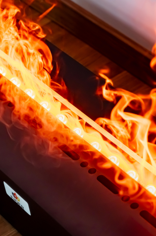 Primer plano del efecto de fuego frío generado por vapor de agua y luces LED RGB