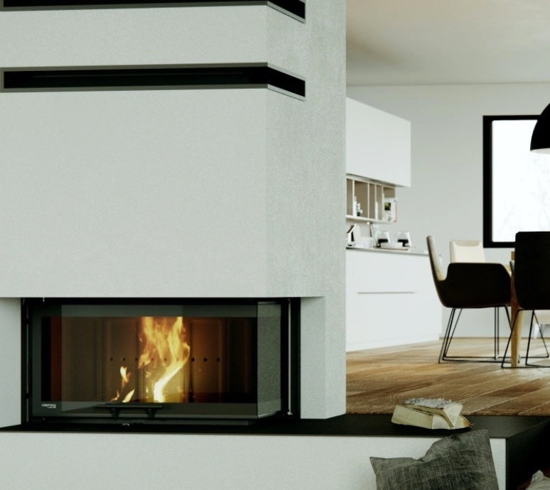 Chimenea de leña Defro Home Intra LA con cristal lateral en esquina instalada en un salón de concepto abierto y diseño minimalista