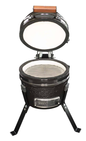 Interior del Mini Kamado The Bastard abierto, mostrando la rejilla de acero inoxidable de 33 cm ideal para 2 a 4 personas