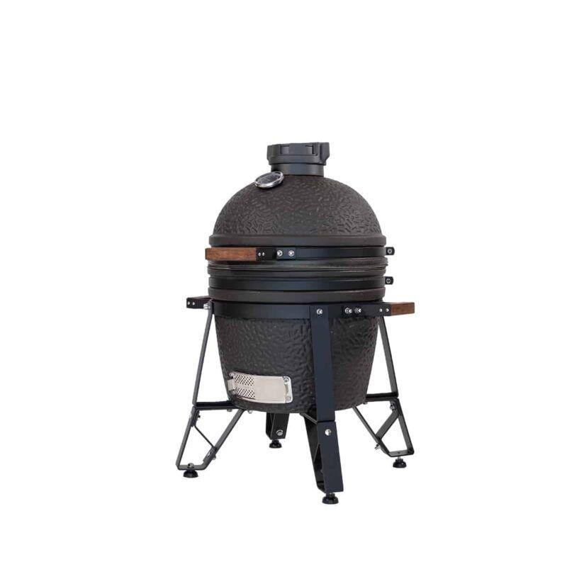 Kamado cerámico The Bastard Urban Compact con acabado negro mate, chasis reforzado y asas de transporte de madera
