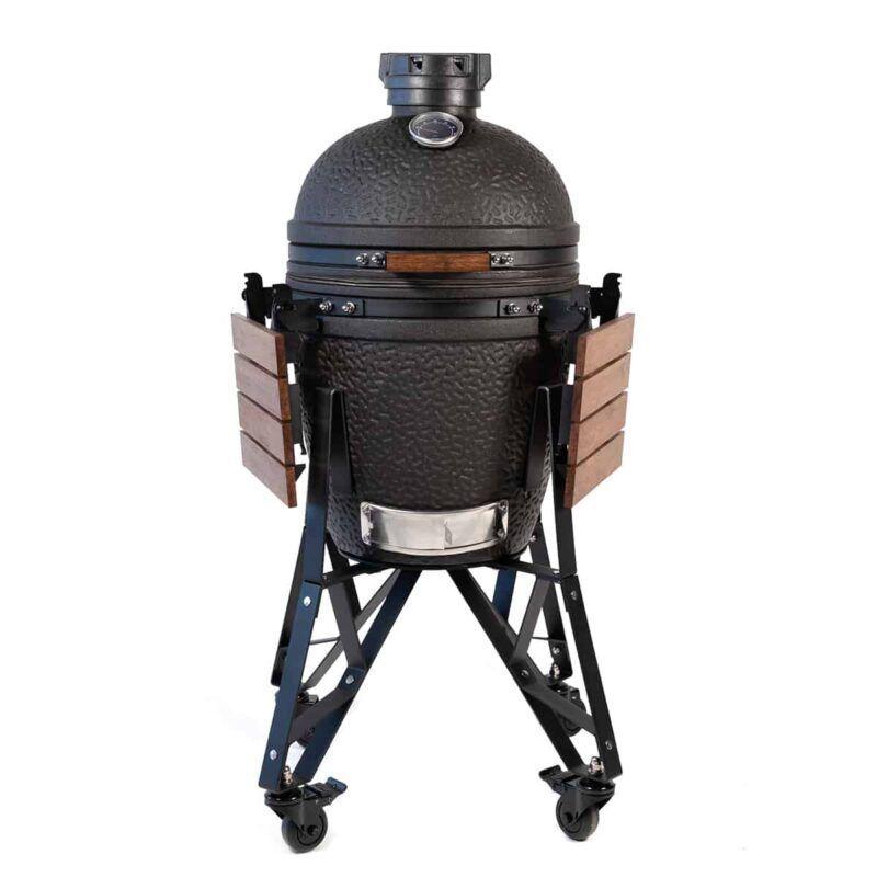 Kamado cerámico The Bastard Urban Medium Complete con acabado negro mate, carro con ruedas y estantes laterales plegables