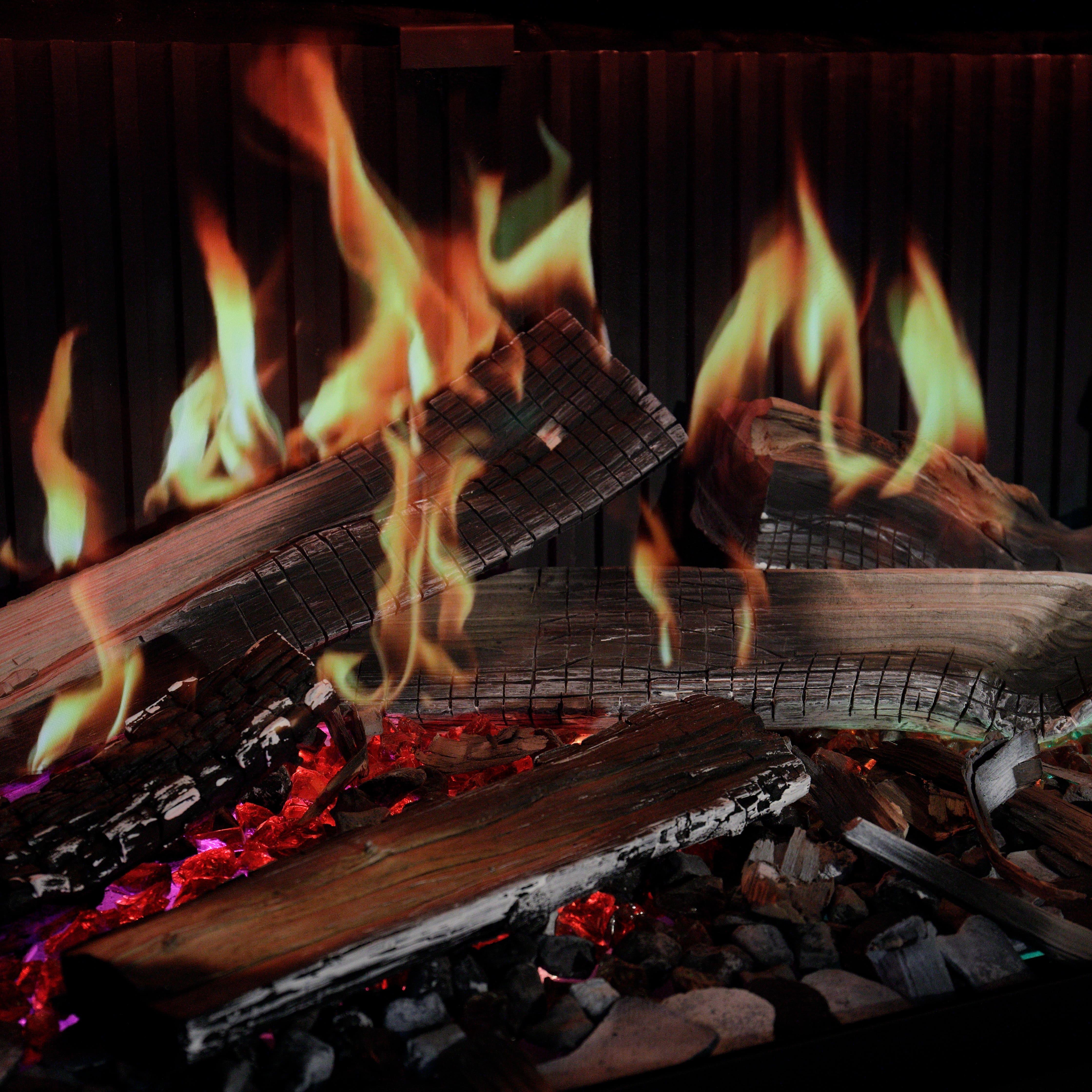 Efecto de llama hiperrealista proyectado mediante tecnología holográfica en la DRU Virtuo.