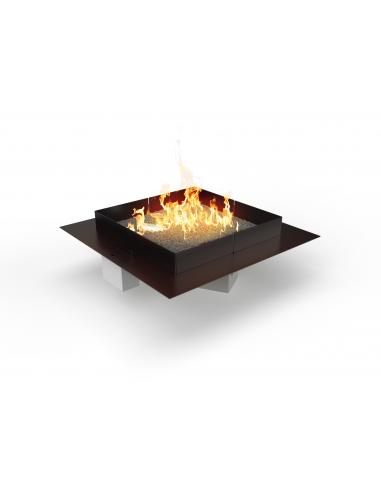 Detalle del quemador Planika Mico encendido con piedras volcánicas decorativas
