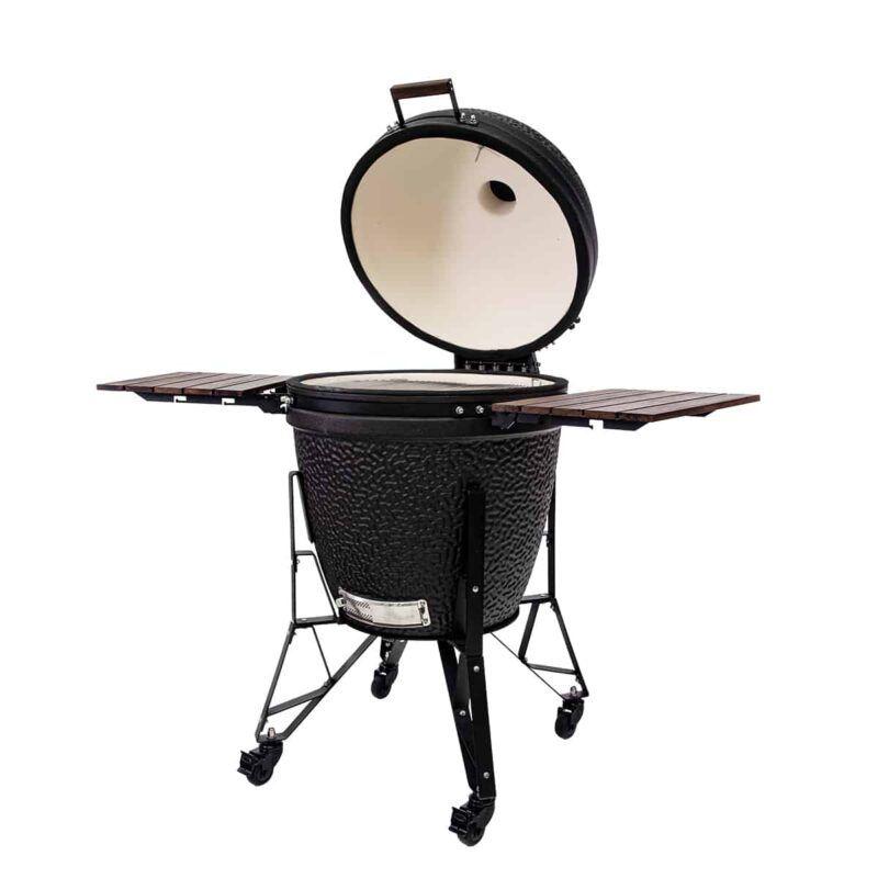 Interior de The Bastard Urban XL con la tapa abierta, revelando una parrilla de 59 cm de diámetro para cocinar múltiples platos