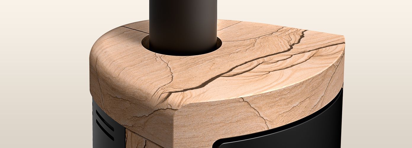 Primer plano de la piedra arenisca utilizada en la estufa Rika Sol, mostrando la calidad de los materiales premium de Rika.